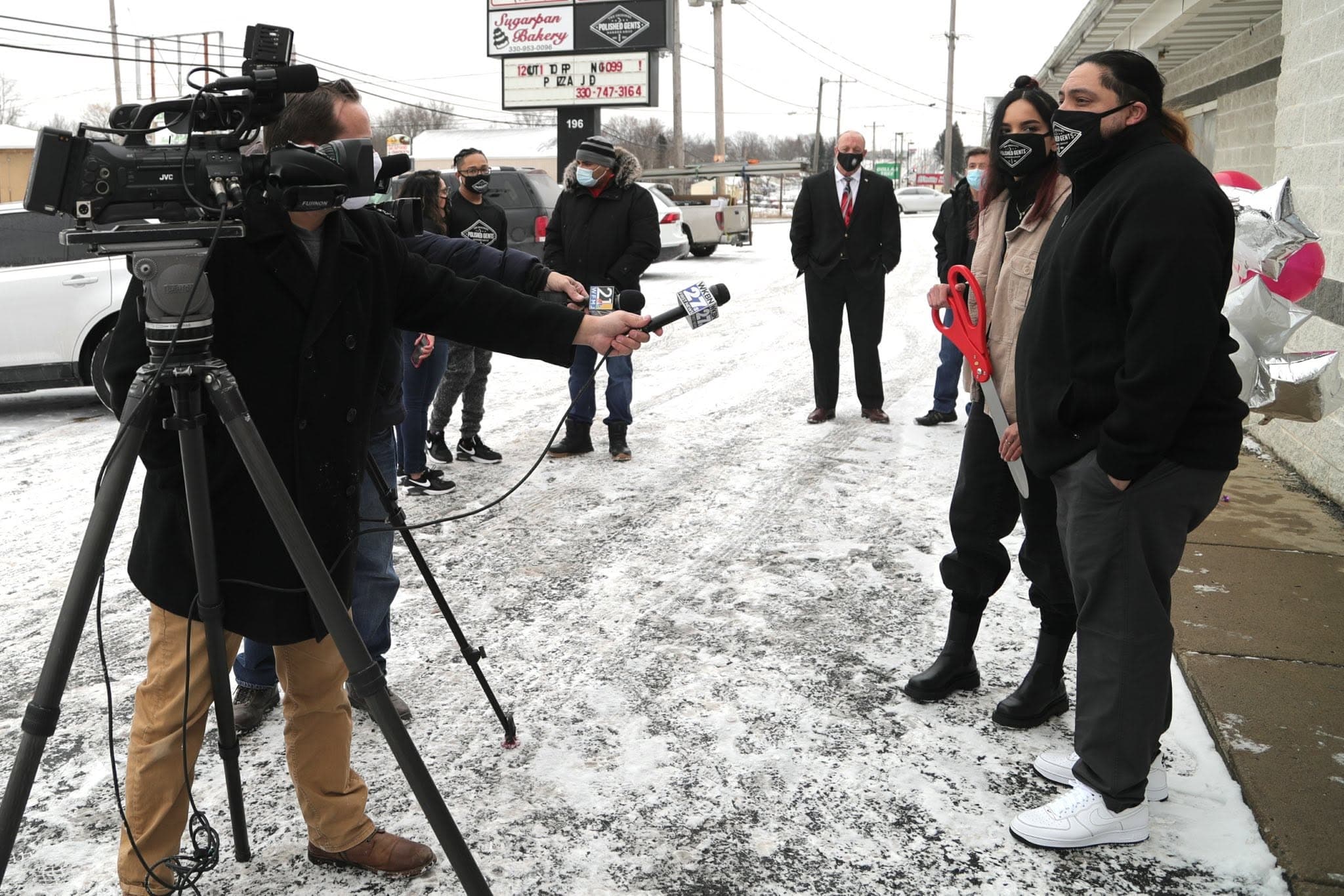 Owner Jose Hernandez with local news at grand opening